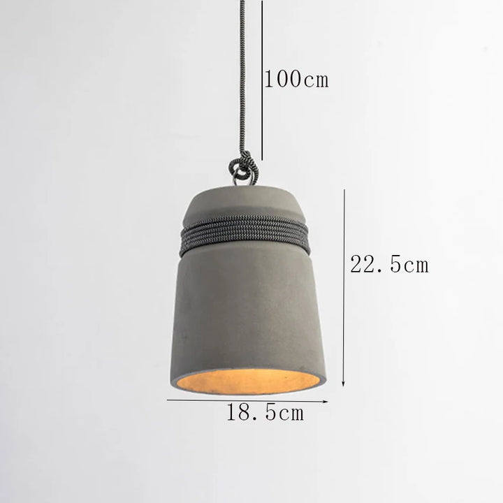 Suspension cloche ciment et corde design scandinave, éclairage doux et naturel pour un intérieur nordique et organique. Taille: 18,5x22,5 cm. Longueur câble: 100 cm. Ampoule incluse.