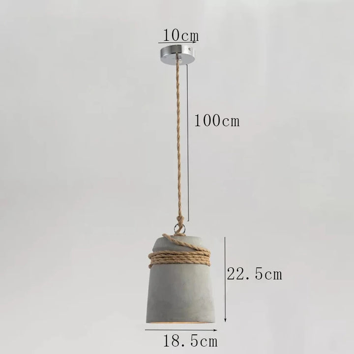 Suspension cloche ciment et corde design scandinave, éclairage doux et naturel pour un intérieur nordique et organique. Taille: 18,5x22,5 cm. Longueur câble: 100 cm. Ampoule incluse. Idéale pour salon et cuisine.