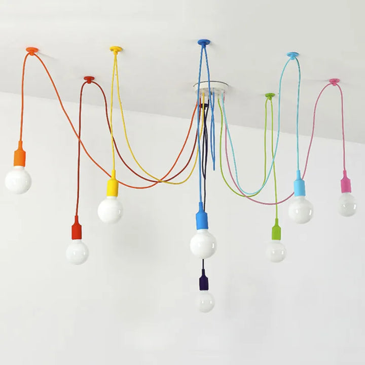 Suspension araignée colorée design moderne avec câbles vifs et douilles assorties, idéale pour éclairer votre intérieur créatif. Parfaite pour salon, chambre ou couloir, elle ajoute une touche ludique et moderne à votre décoration.