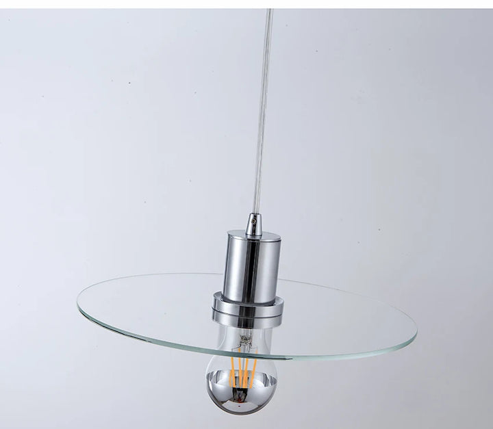 Suspension plate en verre design moderne avec ampoule et câble. Idéale pour cuisine ou salon contemporain. Taille : 28 cm. Tension : 110-240V.